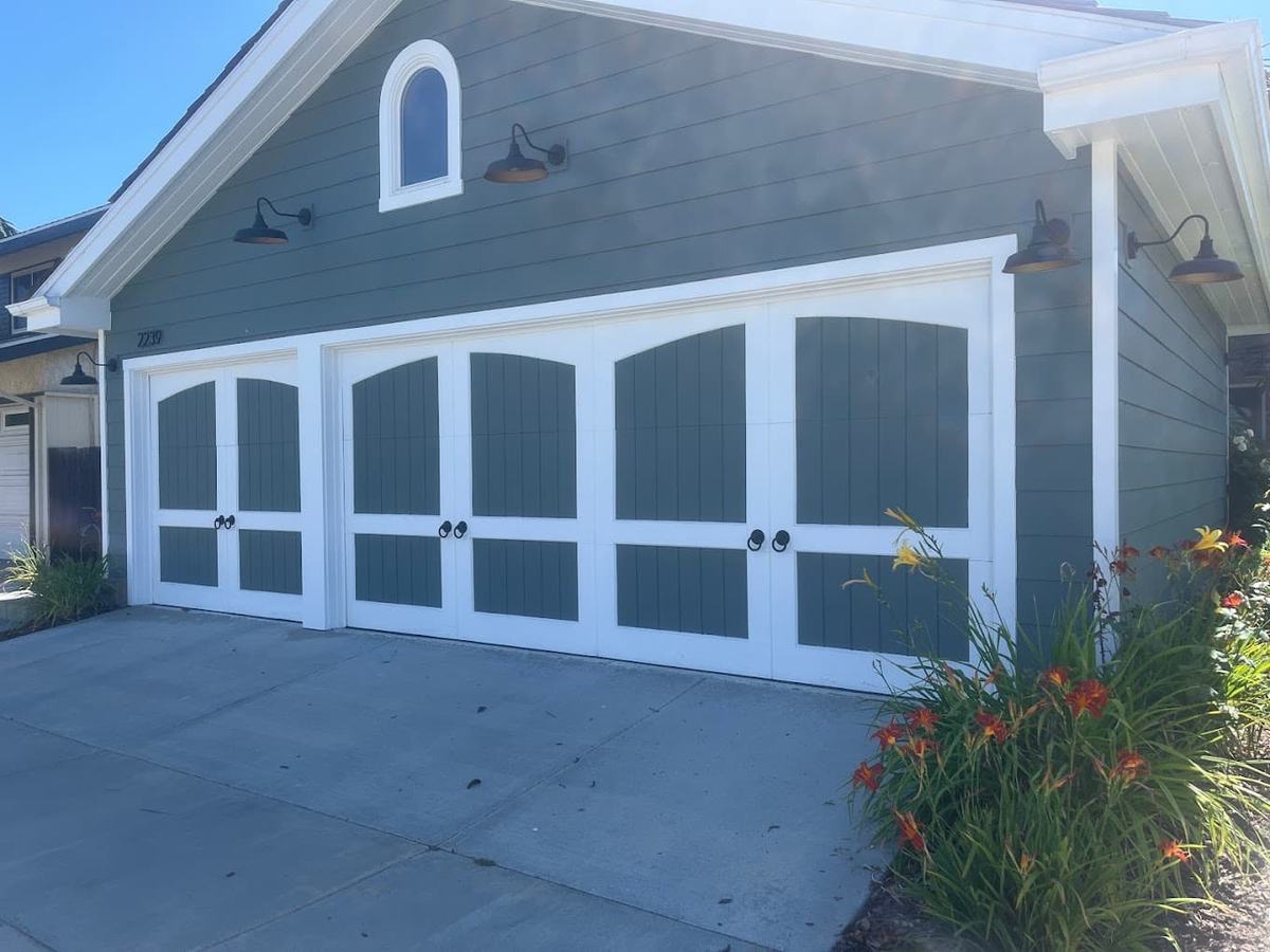 Arched carriage garage door