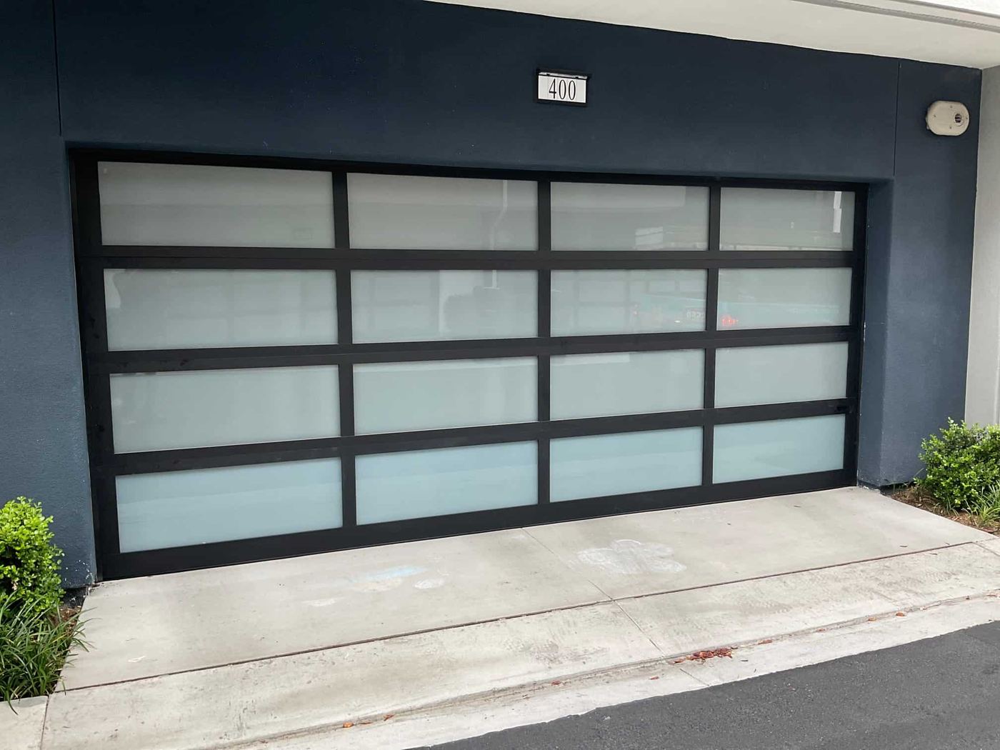 Full-view glass garage door